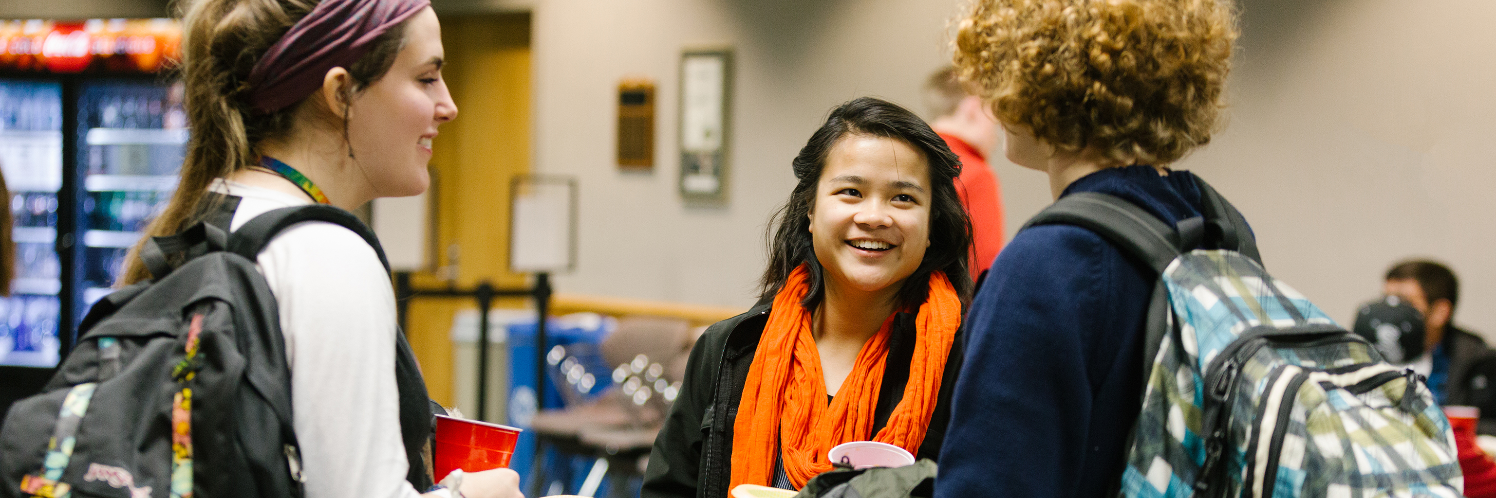 Students gathering for the French Club Mardi Gras celebration.
