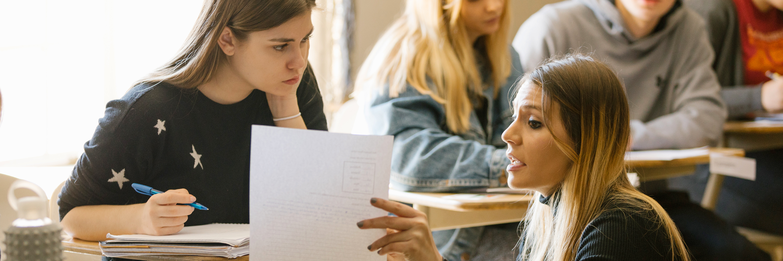 Image of students interacting with the professor in an Italian classroom at Indiana University. 