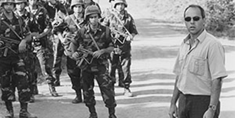 Vincenzo Marra with men dressed as soldiers.