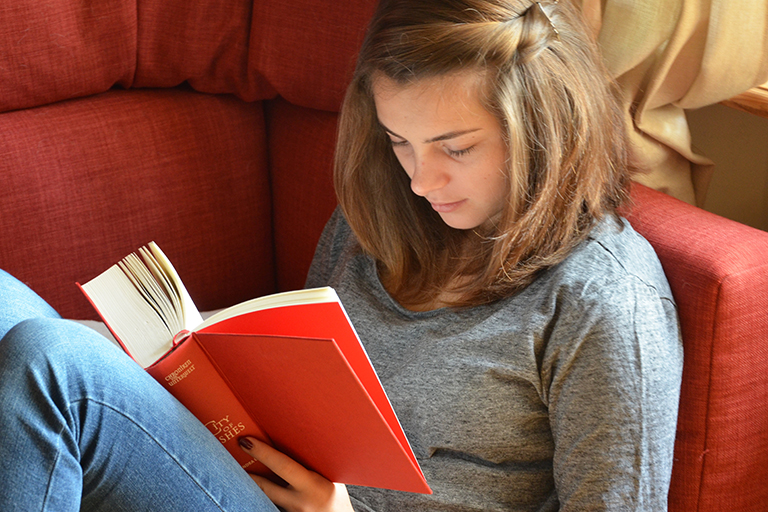 Student reads a book.