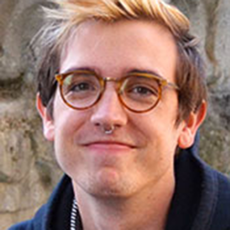 Photo of Will McHenry, a senior Hutton Honors College student majoring in French.