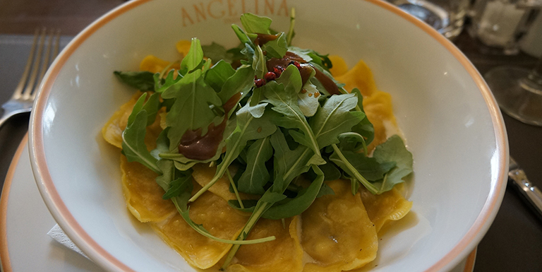 Salad and pasta plate in Paris, France.