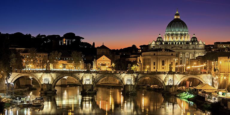 Rome, Italy illuminated at dusk.